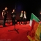 Il Tricolore e la bandiera arcobaleno, simbolo del movimento di liberazione omosessuale sul palco dell\'inaugurazione
