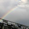 L'arcobaleno fra le strutture metalliche del palazzo dell'Amiat