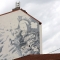 MIllo, il “pittore volante”, torna a Torino per il restyling del gigantesco murale in Barriera di Milano