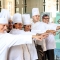 Terra Madre Salone del Gusto 2026 – L’incontro dedicato ai cuochi delle mense scolastiche comunali nella Sala Codici del Museo Nazionale del Risorgimento.