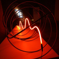 Maya Zignone, B.U. installazione, 2010. Sullo sfondo Antonio Carena, cielo schermo, 1990