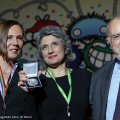L\'On.le Anna Paola Concia,insieme alla sua compagna Ricarda Trautmann, riceve dall\'Assessore alla Cultura e al Centocinquantennale del Comune di Torino Fiorenzo Alfieri, una medaglia della Città di Torino