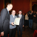 Piero Fassino e Giovanni Maria Ferraris consegnano la cittadinanza onoraria a Ernesto Olivero